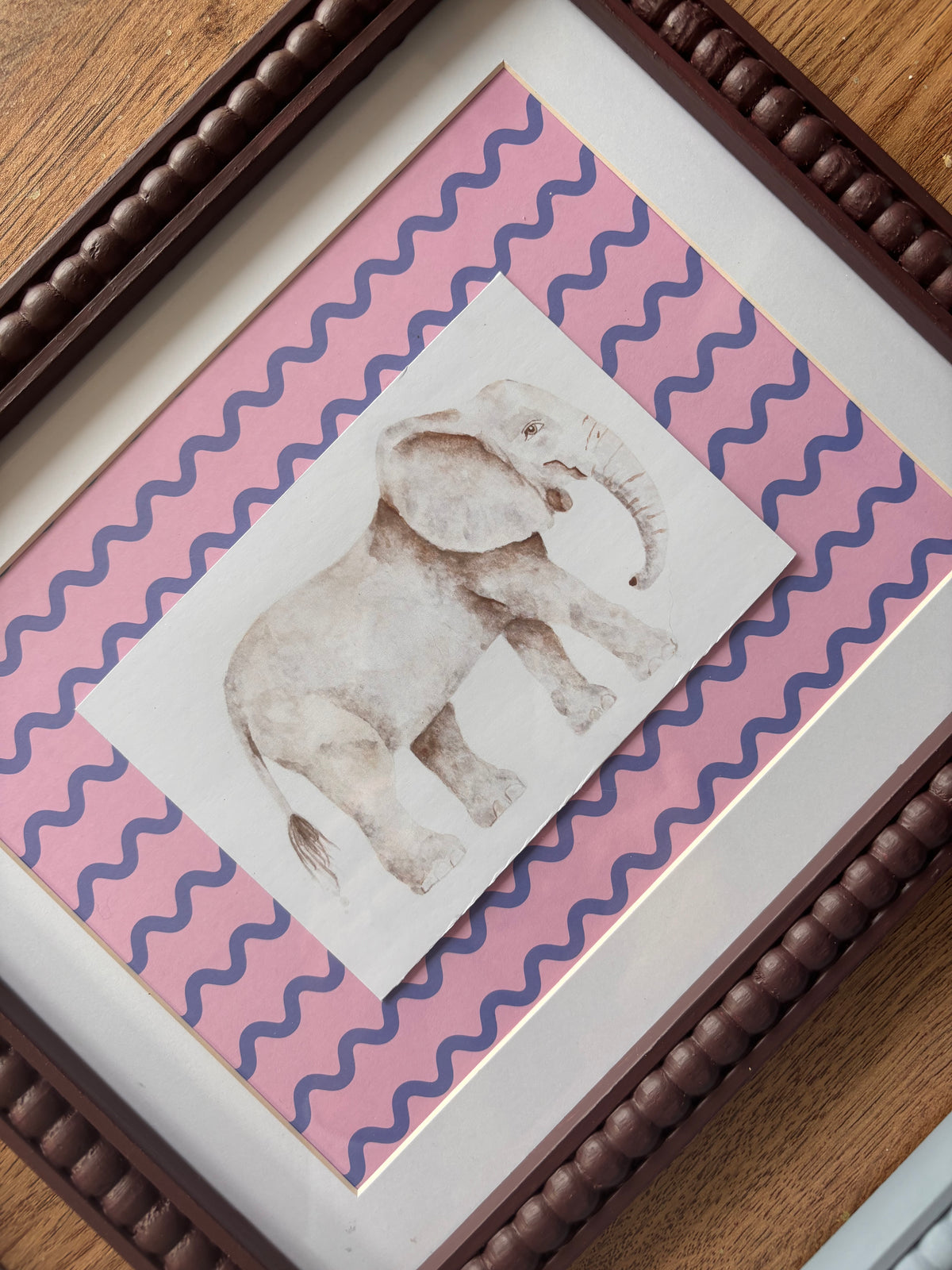 Pink & Blue Wiggle Elephant – Burgundy Bobbin Frame
